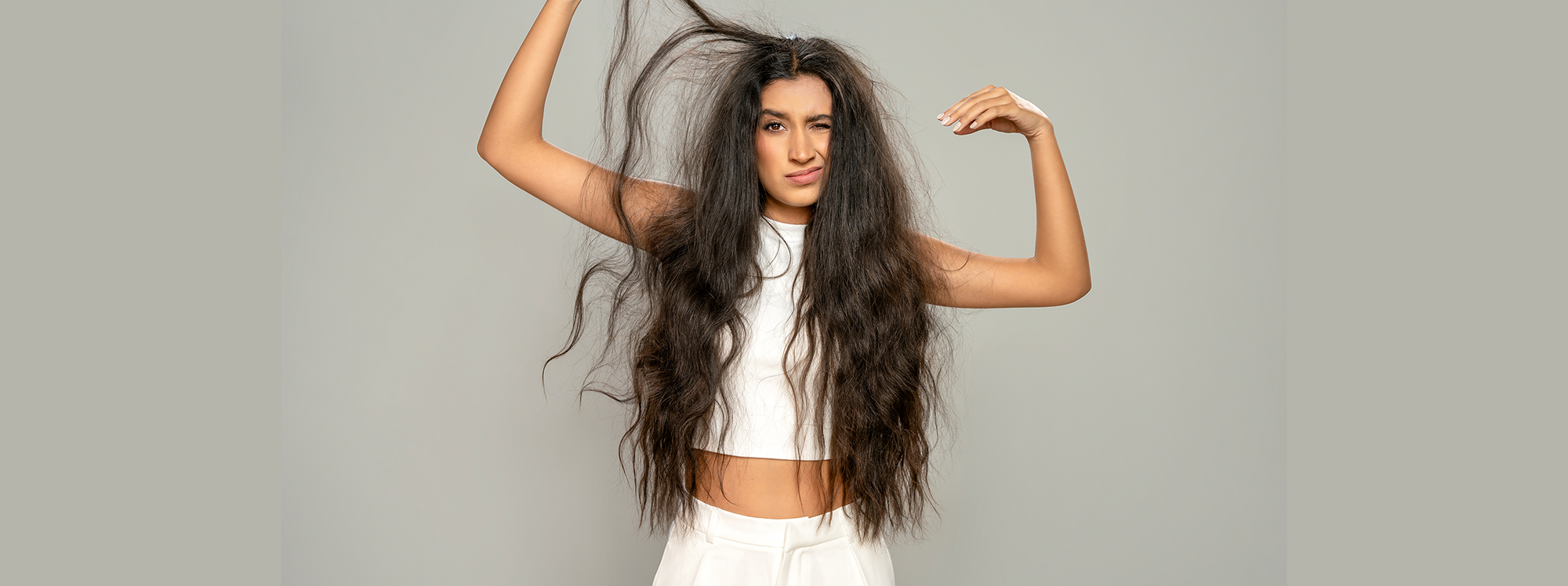 A woman with messy long hair
