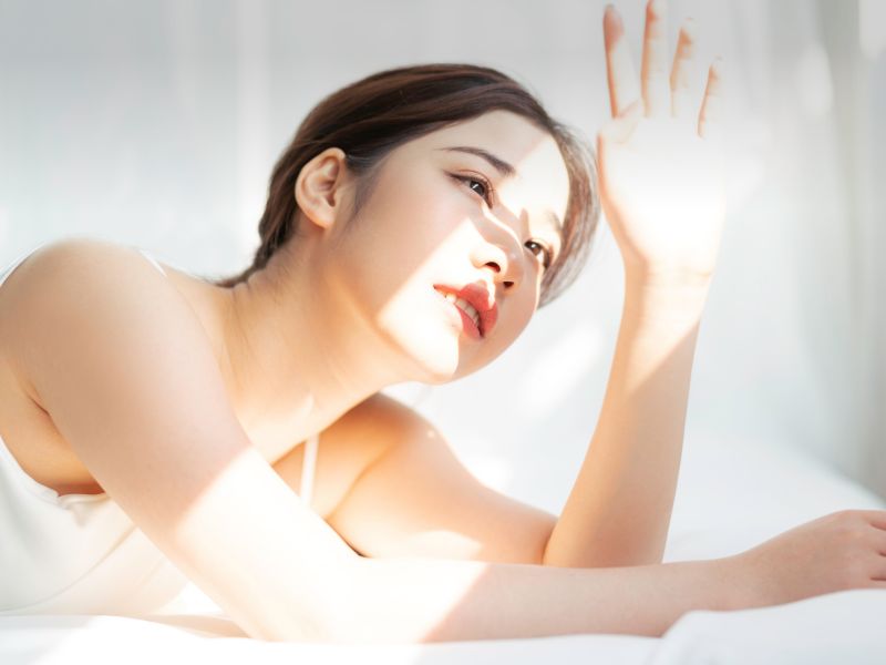 Portrait of Young Asian Girl under the Sun